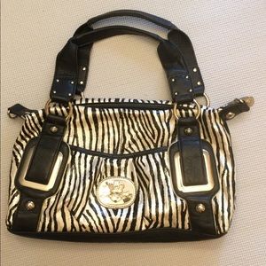 Kathy Van Zeeland  Animal print shoulder bag